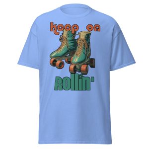 Blue t-shirt with a large pale green and pale orange graphic of old school roller skates with the words "keep on rollin'".